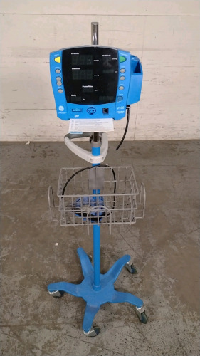 GE DINAMAP V100 VITAL SIGNS MONITOR ON ROLLING STAND