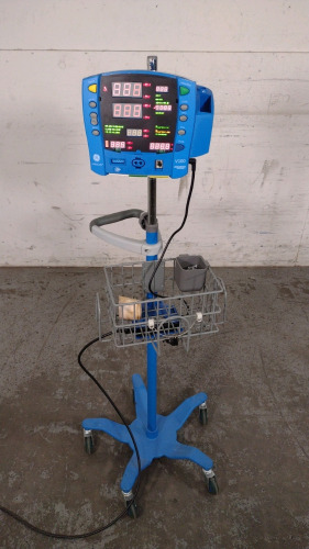 GE DINAMAP V100 VITAL SIGNS MONITOR ON ROLLING STAND