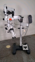 LEICA WILD M691 SURGICAL MICROSCOPE WITH SINGLE BINOCULAR (10X/21 GLASSES), VIEWING ATTACHMENT (10X/21 GLASSES), BOTTOM LENS (F=200MM), FOOTSWITCH, ROLLING STAND