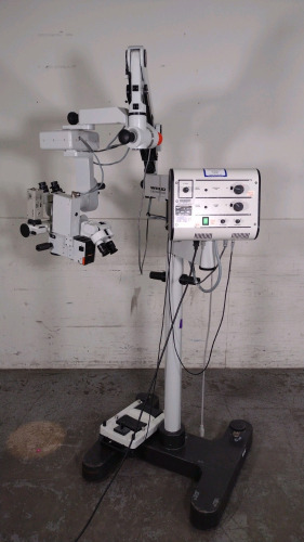 WILD HEERBRUGG WILD M690 SURGICAL MICROSCOPE WITH DUAL BINOCULARS (10X/21B GLASSES AND 10X/21 GLASSES), VIEWING ATTACHMENT (10X/21 GLASSES), BOTTOM LENS (F=200MM), FOOTSWITCH, ROLLING STAND