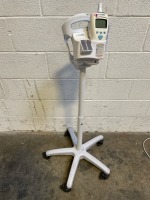 WELCH ALLYN SURE TEMP PLUS THERMOMETER ON ROLLING STAND