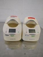 MEDELA LOT OF TWO MILK WARMERS