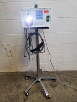 SPECIALTIES OF SURGERY XLS-300 LIGHT SOURCE W/HEADLIGHT ON ROLLING STAND