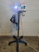 SURGICAL ADVANTAGE SA300 LIGHT SOURCE W/HEADLIGHT ON ROLLING STAND