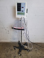 DATASCOPE ACCUTORR PLUS PATIENT MONITOR ON ROLLING STAND
