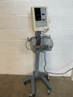 DATASCOPE ACCUTORR PLUS PATIENT MONITOR ON ROLLING STAND