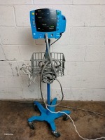 GE CARESCAPE V100 PATIENT MONITOR ON ROLLING STAND