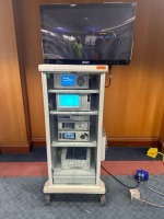 STRYKER 1588 ARTHROSCOPY TOWER TO INCLUDE: 1588 AIM CAMERA, SDC3 HD INFORMATION MANAGEMENT SYSTEM, L9000 LED LIGHT SOURCE, SYNK WIRELESS TRANSMITTER , PNEUMO SURE, HIGH FLOW INSUFFLATOR, SDP1000 PRINTER AND 32" 4K DISPLAY WITH COVER ON CART LOCATED AT: LO