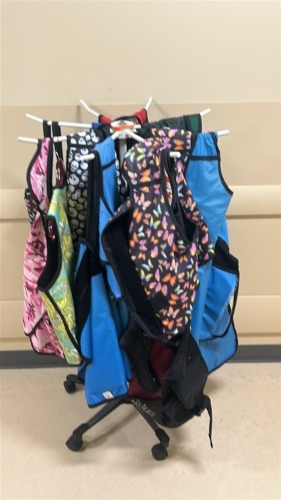 ROLLING X-RAY GARMENT RACK W/ ASSORTED GARMENTS LOCATED AT: LOCATED AT: 1 MEDICAL CENTER BLVD, CHESTER, PA 19013 4/OR 2