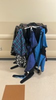 ROLLING X-RAY GARMENT RACK W/ ASSORTED GARMENTS LOCATED AT: LOCATED AT: 1 MEDICAL CENTER BLVD, CHESTER, PA 19013 4/OR HALL