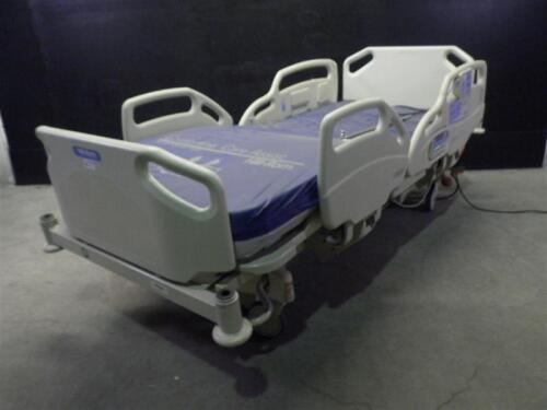 HILL-ROM P1170D CARE ASSIST ES HOSPITAL BED WITH HEAD AND FOOT BOARDS