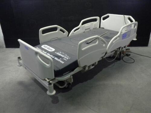 HILL-ROM P1170E CARE ASSIST ES HOSPITAL BED WITH HEAD AND FOOT BOARDS