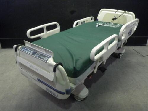 STRYKER SECURE 3002 HOSPITAL BED WITH HEAD AND FOOT BOARDS (BED EXIT, SCALE)