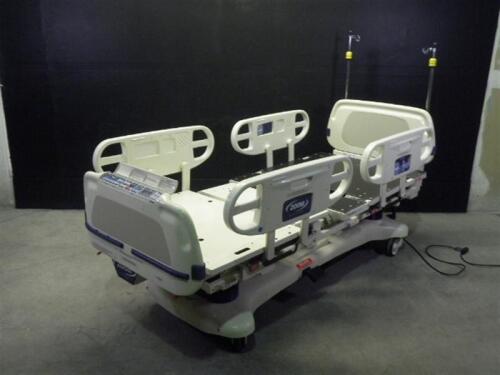 STRYKER 2040 CRITICAL CARE HOSPITAL BED WITH HEAD AND FOOT BOARDS (BED EXIT, SCALE)