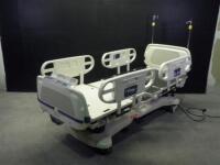 STRYKER 2040 CRITICAL CARE HOSPITAL BED WITH HEAD AND FOOT BOARDS (BED EXIT, SCALE)