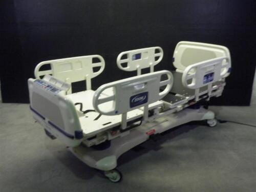 STRYKER 2040 CRITICAL CARE HOSPITAL BED WITH HEAD AND FOOT BOARDS (BED EXIT, SCALE)