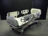 STRYKER 2040 CRITICAL CARE HOSPITAL BED WITH HEAD AND FOOT BOARDS (BED EXIT, SCALE)
