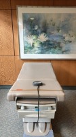 RITTER 222 EXAM TABLE W/ FOOT CONTROL, BEIGET LOCATED AT: LOCATED AT: 1 MEDICAL CENTER BLVD, CHESTER, PA 19013
