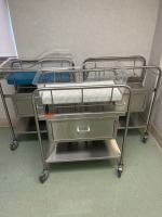 BASSINET, 1 DRAWER, 1 SHELF, STAINLESS STEEL, WB, QTY. (2), NB (1) LOCATED AT: LOCATED AT: 1 MEDICAL CENTER BLVD, CHESTER, PA 19013 3/ W/ HALLWAY