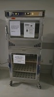ENTHERMICS EC1730BL WARMING CABINET, DUAL COMPARTMENT, GLASS DOOR, MOBILE LOCATED AT: LOCATED AT: 1 MEDICAL CENTER BLVD, CHESTER, PA 19013 G/ ED/ HALLWAY OTS HAZMAT STORAGE