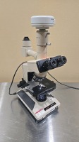 OLYMPUS BH-2 LAB MICROSCOPE W/ 2 OCULAR LENSES, 4 OBJECTIVE LENSES AND OLYMPUS DP 12 CAMERA ATTACHMENT LOCATED AT: LOCATED AT: 1 MEDICAL CENTER BLVD, CHESTER, PA 19013 1/ LOBBY