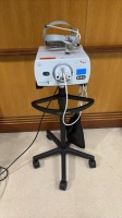 INTEGRA LUXTEC MLX LIGHT SOURCE W/ HEADLAMP ON ROLLING STAND LOCATED AT: LOCATED AT: 1 MEDICAL CENTER BLVD, CHESTER, PA 19013