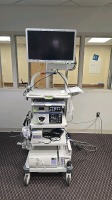 OLYMPUS CV-190 ENDOSCOPY TOWER TO INCLUDE: OLYMPUS EVIS EXERA III CV-190 VIDEO PROCESSOR W/ MAJ-1430 PIGTAIL, OLYMPUS EVIS EXERA III CLV-190 LIGHT SOURCE , OLYMPUS OBCU BALLOON CONTROL UNIT, OLYMPUS FP-2 FLUSHING PUMP, OLYMPUS UCR ENDOSCOPIC CO2 REGULATIO