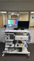 OLYMPUS CV-190 ENDOSCOPY TOWER TO INCLUDE: OLYMPUS EVIS EXERA III CV-190 VIDEO PROCESSOR, OLYMPUS EVIS EXRA III CLV-190 LIGHT SOURCE, OLYMPUS AFU-100 FLUSHING PUMP, OLYMPUS ESG-100 ELECTROSURGICAL UNIT, OLYMPUS UCR CO2 REGULATION UNIT, FOOTSWITCHES, QTY. 