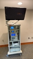 STRYKER 1588 ARTHROSCOPY TOWER TO INCLUDE: 1588 AIM CAMERA, SDC3 HD INFORMATION MANAGEMENT SYSTEM, L9000 LED LIGHT SOURCE, SYNK WIRELESS TRANSMITTER , PNEUMO SURE, HIGH FLOW INSUFFLATOR, SDP1000 PRINTER AND 32" 4K DISPLAY WITH COVER ON CART LOCATED AT: LO