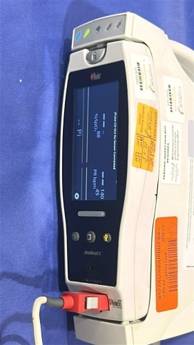 MASIMO RADICAL 7 PULSE OXIMETER WITH CRADLE AND ATTACHMENT CABLES LOCATED AT: LOCATED AT: 1 MEDICAL CENTER BLVD, CHESTER, PA 19013