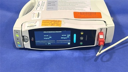 MASIMO RADICAL 7 PULSE OXIMETER WITH CRADLE AND ATTACHMENT CABLES LOCATED AT: LOCATED AT: 1 MEDICAL CENTER BLVD, CHESTER, PA 19013