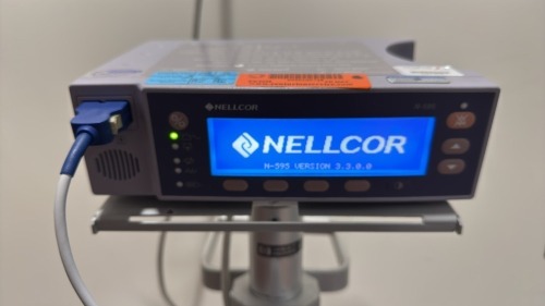 NELLCOR N-595 PULSE OXIMETER ON ROLLING STAND LOCATED AT: LOCATED AT: 1 MEDICAL CENTER BLVD, CHESTER, PA 19013 3/MC HALLWAY
