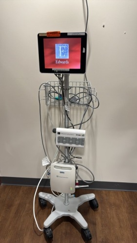 EDWARDS LIFE SCIENCES UTC-W10BO PATIENT MONITOR W/ EV1000 DATA BOX, PUMP UNIT ON ROLLING STAND LOCATED AT: LOCATED AT: 1 MEDICAL CENTER BLVD, CHESTER, PA 19013 4/NICU/4104