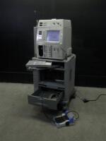 ALCON SURGICAL 800CS PHACO SYSTEM WITH ILLUMINATOR AND FOOTSWITCH ON ROLLING STAND