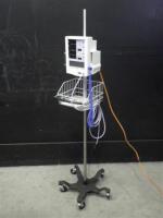 DATASCOPE ACCUTORR PLUS VITAL SIGNS MONITOR WITH BP CABLE ON ROLLING STAND