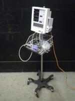 DATASCOPE ACCUTORR PLUS VITAL SIGNS MONITOR WITH BP CABLE ON ROLLING STAND