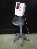 DATASCOPE ACCUTORR PLUS PATIENT MONITOR ON ROLLING STAND