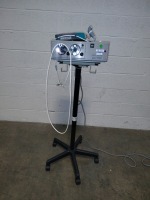 LUXTEC 9300XDP LIGHT SOURCE W/HEADLIGHT ON ROLLING STAND