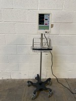 DATASCOPE ACCUTORR PLUS PATIENT MONITOR ON ROLLING STAND