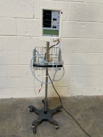 DATASCOPE ACCUTORR PLUS PATIENT MONITOR ON ROLLING STAND