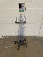 DATASCOPE ACCUTORR PLUS PATIENT MONITOR ON ROLLING STAND