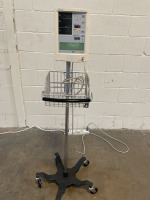 DATASCOPE ACCUTORR PLUS PATIENT MONITOR ON ROLLING STAND