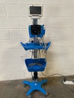 GE DINAMAP V100 CARESCAPE PATIENT MONITOR TO INCLUDE CAPSULE NEURON MONITOR ON ROLLING STAND