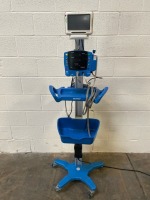 GE DINAMAP V100 CARESCAPE PATIENT MONITOR TO INCLUDE CAPSULE NEURON MONITOR ON ROLLING STAND