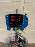 GE DINAMAP V100 CARESCAPE PATIENT MONITOR ON ROLLING STAND