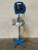 GE DINAMAP PROCARE PATIENT MONITOR ON ROLLING STAND