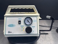 OHIO MEDICAL CARE-E-VAC 3 PORTABLE SUCTION UNIT