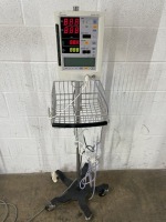 DATASCOPE ACCUTORR PLUS PATIENT MONITOR ON ROLLING STAND