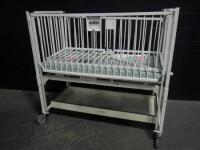 HARD INFANT CRIB