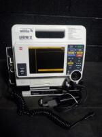 MEDTRONIC LIFEPAK 12 BIPHASIC DEFIB WITH 3 LEAD,PACING,ANALYZE,ECG,NIBP,SPO2,CO2,BATTERIES